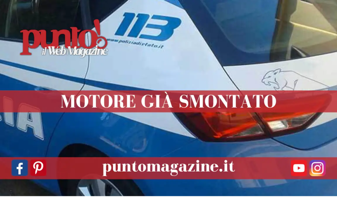 Auto con motore smontato