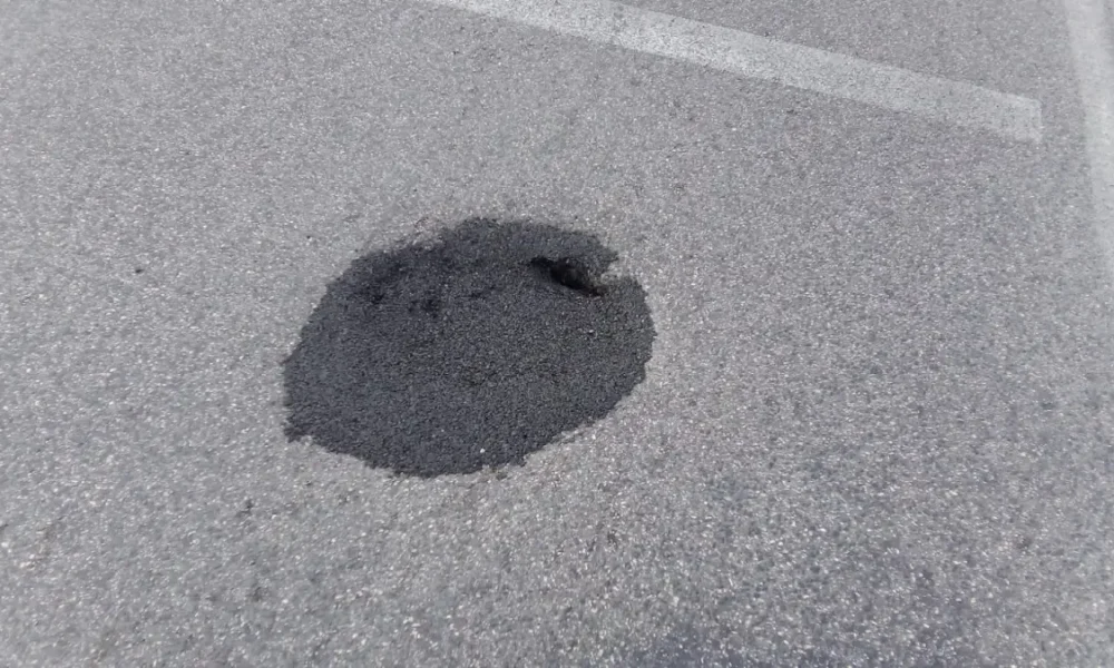 Qualiano buca parcheggio Cimitero